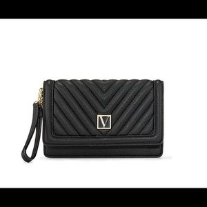 A Victoria Secrets black wallet and a clutch all in one!